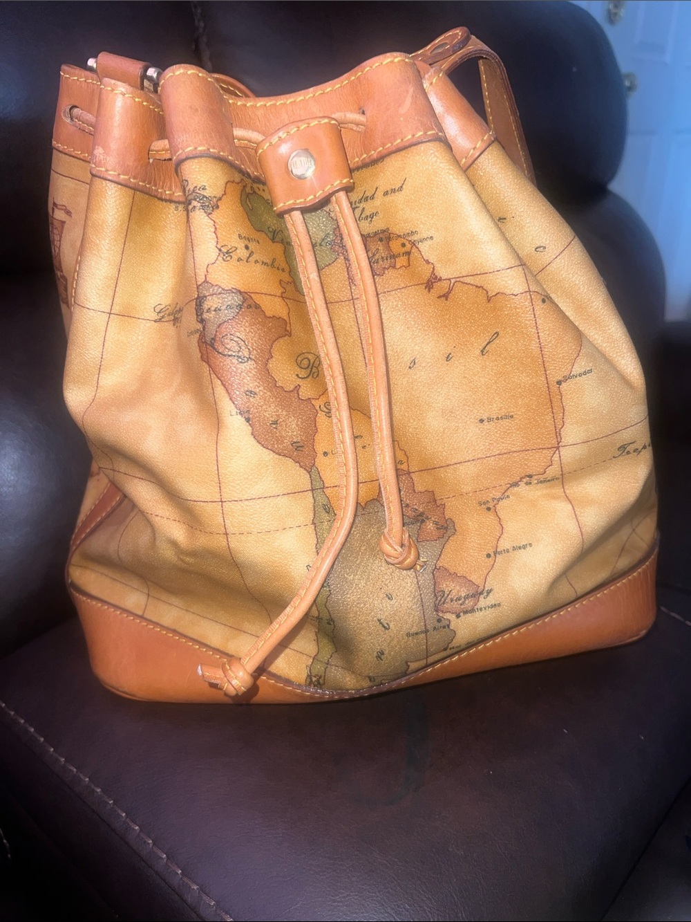 Alviero Martini Map-Print Drawstring Duffel in Tan and Brown